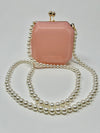 Pink Acrylic Clutch with Pearl Strap